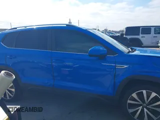 2022 Volkswagen Taos SE z VIN 3VVRX7B28NM088778, wystawiony jako IAAI lot #41624907 z przebiegiem 32 903 mil mil oraz . Historia ofert i sprzedaży dostępna na DreamBid. Obrazek 13.