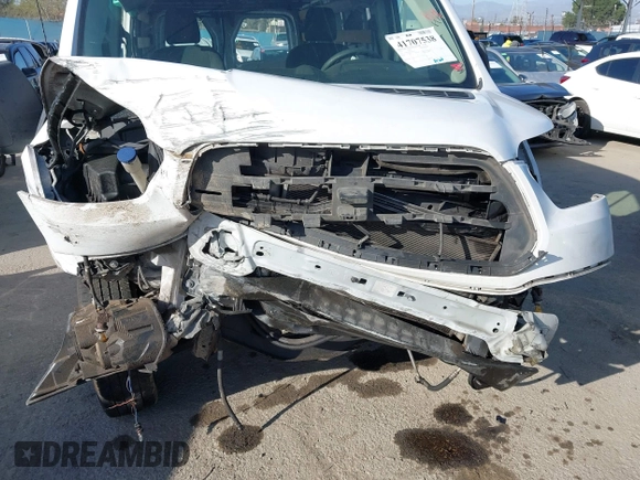 2018 Ford Transit with VIN 1FTYR1ZM2JKA64616, listed as a IAAI auction lot 41707538 with 221,167 mi miles and . Bid and sale history available at DreamBid. Image 21.