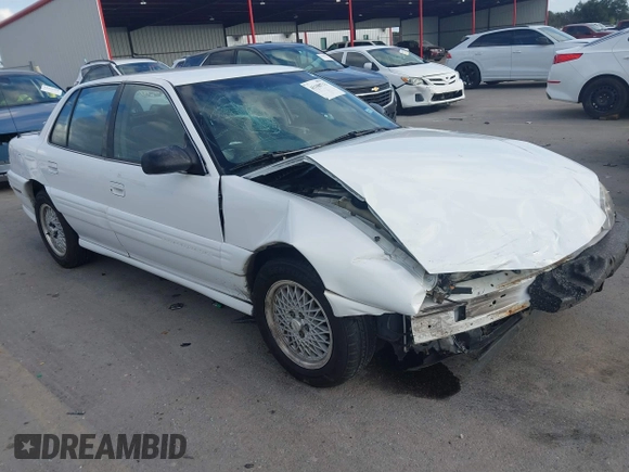 1997 Pontiac Grand Am SE with VIN 1G2NE52T3VC809661, listed as a IAAI auction lot 41100711 with 168,686 mi miles and . Bid and sale history available at DreamBid. Image 1.
