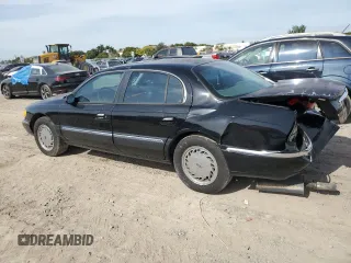 1998 Lincoln Continental with VIN 1LNFM97V8WY742639, listed as a Copart auction lot 82138303 with 268,814 mi miles and Salvage Title. Bid and sale history available at carsss.com. Image 2.