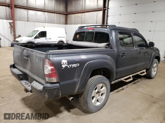 2009 Toyota Tacoma z VIN 3TMLU42N79M027000, wystawiony jako Copart lot #58371365 z przebiegiem 168 989 mil mil oraz Szkoda całkowita • Salvage title. Historia ofert i sprzedaży dostępna na DreamBid. Obrazek 3.