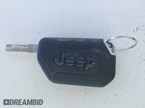 2022 Jeep Gladiator Rubicon with VIN 1C6JJTBG6NL166081, listed as a IAAI auction lot 42204431 with 40,568 mi miles and . Bid and sale history available at DreamBid. Image 11.