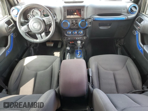 2018 Jeep Wrangler JK Unlimited Sport S with VIN 1C4BJWDG3JL899209, listed as a Copart auction lot 67705634 with 100,679 mi miles and Salvage Title. Bid and sale history available at carsss.com. Image 8.