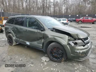 2018 Dodge Journey SE with VIN 3C4PDCAB7JT445621, listed as a Copart auction lot 43879445 with 100,700 mi miles and Salvage Title. Bid and sale history available at carsss.com. Image 4.