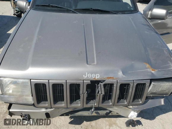 1998 Jeep Grand Cherokee Limited with VIN 1J4GZ78S5WC325148, listed as a Copart auction lot 67780424 with Not provided miles and Salvage title. Bid and sale history available at DreamBid. Image 11.