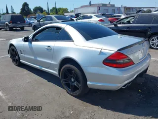 2009 Mercedes-Benz SL 55/63 AMG with VIN WDBSK70F69F148436, listed as a IAAI auction lot 42770233 with 120,523 mi miles and . Bid and sale history available at DreamBid. Image 3.