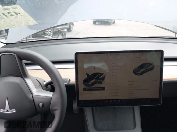 2023 Tesla Model 3 z VIN 5YJ3E1EAXPF403095, wystawiony jako IAAI lot #42151764 z przebiegiem 17 872 mil mil oraz . Historia ofert i sprzedaży dostępna na DreamBid. Obrazek 18.