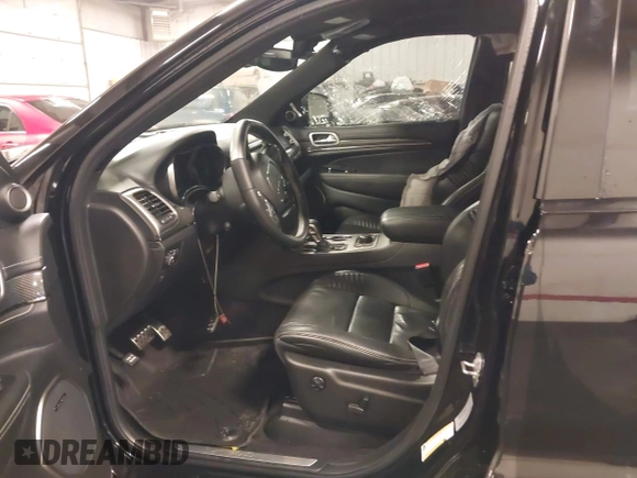 2017 Jeep Grand Cherokee SRT with VIN 1C4RJFDJ9HC739324, listed as a IAAI auction lot 40898998 with 92,547 mi miles. Bid and sale history available at carsss.com. Image 5.