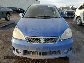 2005 Suzuki Aerio SX z VIN JS2RC61H655300809, wystawiony jako Copart lot #42507415 z przebiegiem 273 937 mil mil oraz Szkoda całkowita • Salvage title. Historia ofert i sprzedaży dostępna na DreamBid. Obrazek 5.
