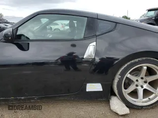 2009 Nissan 370Z Touring with VIN JN1AZ44E29M406023, listed as a Copart auction lot 73721324 with 108,072 mi miles and Salvage Title. Bid and sale history available at carsss.com. Image 12.