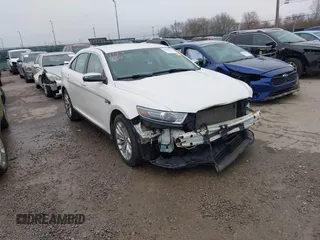 2015 Ford Taurus Limited with VIN 1FAHP2F85FG117635, listed as a IAAI auction lot 41979311 with 104,314 mi miles. Bid and sale history available at carsss.com. Image 1.