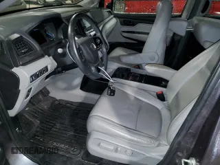 2020 Honda Odyssey Touring with VIN 5FNRL6H88LB009174, listed as a Copart auction lot 86636264 with 67,491 mi miles and Salvage Title. Bid and sale history available at DreamBid. Image 7.