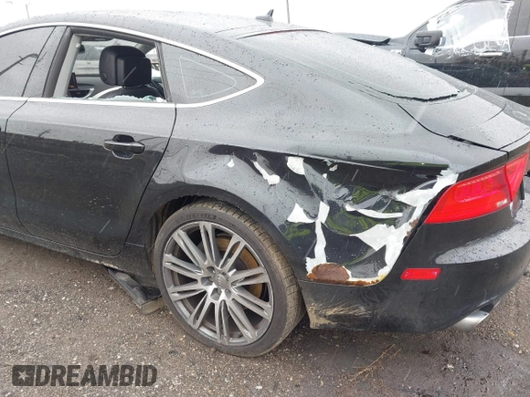2012 Audi A7 Premium Plus with VIN WAUYGAFC0CN096027, listed as a IAAI auction lot 40881391 with 155,433 mi miles and . Bid and sale history available at DreamBid. Image 20.