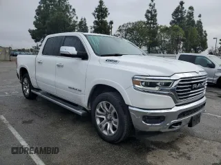 2020 Ram 1500 with VIN 1C6RREKG4LN401571, listed as a Copart auction lot 43620245 with 99,979 mi miles and Salvage title. Bid and sale history available at DreamBid. Image 4.