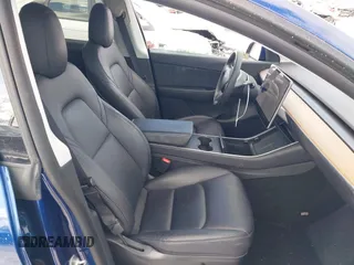 2021 Tesla Model Y Long Range with VIN 5YJYGDEE1MF083780, listed as a IAAI auction lot 41549308 with 37,372 mi miles and . Bid and sale history available at DreamBid. Image 5.