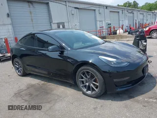 2023 Tesla Model 3 with VIN 5YJ3E1EA4PF565899, listed as a IAAI auction lot 42436473 with 30,141 mi miles and . Bid and sale history available at DreamBid. Image 1.