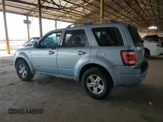 2008 Ford Escape Hybrid with VIN 1FMCU49H98KA28845, listed as a Copart auction lot 52648135 with 210,756 mi miles and Salvage title. Bid and sale history available at DreamBid. Image 2.