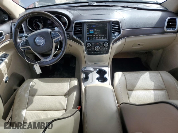 2014 Jeep Grand Cherokee Overland with VIN 1C4RJFCG4EC326325, listed as a Copart auction lot 49166645 with 128,261 mi miles and Salvage Title. Bid and sale history available at DreamBid. Image 8.