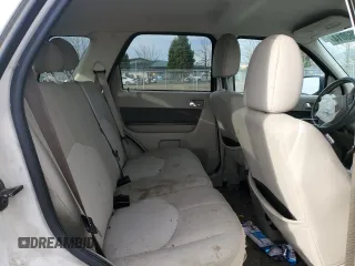 2009 Mercury Mariner Hybrid z VIN 4M2CU29309KJ04980, wystawiony jako Copart lot #85360014 z przebiegiem 166 860 mil mil oraz Szkoda całkowita • Salvage title. Historia ofert i sprzedaży dostępna na DreamBid. Obrazek 11.