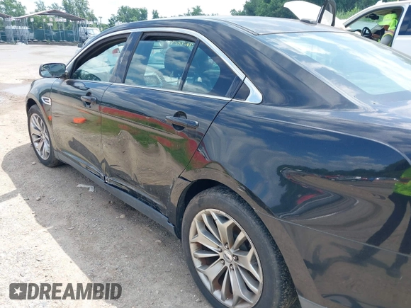 2013 Ford Taurus Limited z VIN 1FAHP2F85DG103747, wystawiony jako IAAI lot #42763099 z przebiegiem 181 891 mil mil oraz . Historia ofert i sprzedaży dostępna na DreamBid. Obrazek 13.