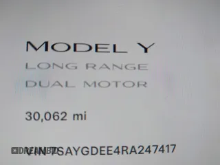 2024 Tesla Model Y Long Range with VIN 7SAYGDEE4RA247417, listed as a IAAI auction lot 41735632 with 30,062 mi miles. Bid and sale history available at carsss.com. Image 7.