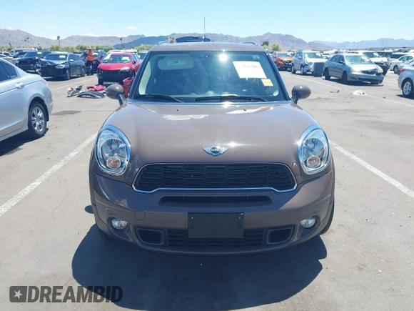 2013 MINI Countryman S ALL4 with VIN WMWZC5C54DWP34224, listed as a IAAI auction lot 42141400 with 33,307 mi miles and . Bid and sale history available at DreamBid. Image 12.