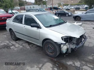 2004 Toyota Corolla CE with VIN 1NXBR32E24Z275615, listed as a IAAI auction lot 42180665 with 210,598 mi miles and . Bid and sale history available at DreamBid. Image 1.