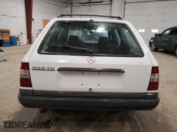 1987 Mercedes-Benz 300 with VIN WDBEB93D9HF036375, listed as a Copart auction lot 85326994 with 175,986 mi miles and Salvage Title. Bid and sale history available at DreamBid. Image 6.
