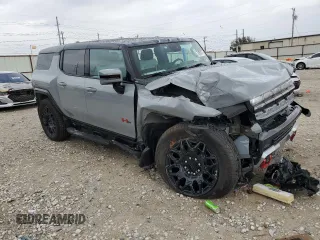 2024 GMC Hummer EV 2X with VIN 1GKB0NDE3RU110966, listed as a Copart auction lot 79210474 with 3,569 mi miles and Salvage Title. Bid and sale history available at carsss.com. Image 4.
