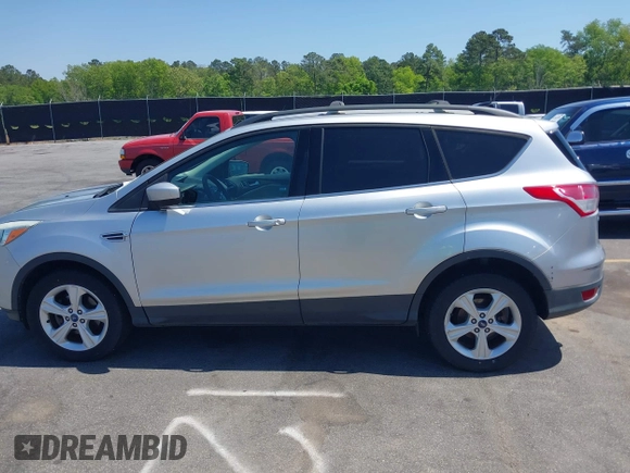 2013 Ford Escape SE with VIN 1FMCU0GX0DUA19811, listed as a IAAI auction lot 42009015 with 135,662 mi miles. Bid and sale history available at carsss.com. Image 14.