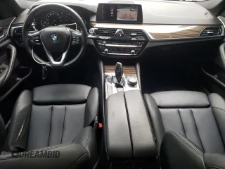 2018 BMW 5 Series 530i with VIN WBAJA5C53JG898430, listed as a Copart auction lot 54243195 with 129,854 mi miles and Salvage title. Bid and sale history available at DreamBid. Image 8.