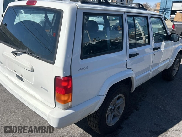 2000 Jeep Cherokee Classic with VIN 1J4FF58S4YL219673, listed as a Copart auction lot 48809075 with 198,334 mi miles and Salvage Title. Bid and sale history available at carsss.com. Image 4.