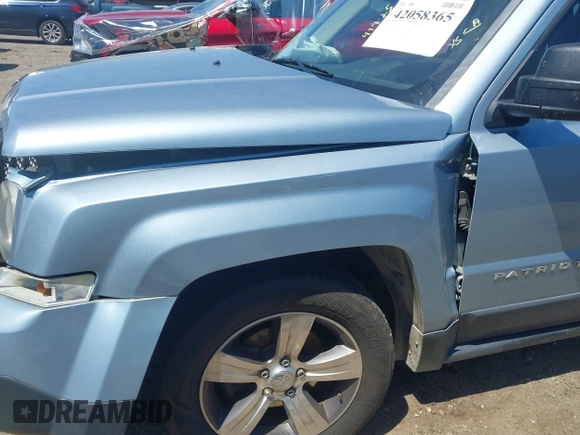 2013 Jeep Patriot Sport z VIN 1C4NJPBA1DD109325, wystawiony jako IAAI lot #42058365 z przebiegiem 155 523 mil mil oraz . Historia ofert i sprzedaży dostępna na DreamBid. Obrazek 14.