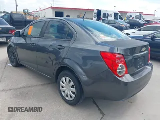 2013 Chevrolet Sonic LS with VIN 1G1JA5SH4D4138164, listed as a IAAI auction lot 42677319 with 144,244 mi miles and . Bid and sale history available at DreamBid. Image 3.