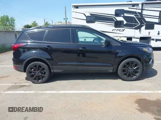 2019 Ford Escape SE with VIN 1FMCU0GD4KUB29621, listed as a IAAI auction lot 42062095 with 137,807 mi miles. Bid and sale history available at carsss.com. Image 14.