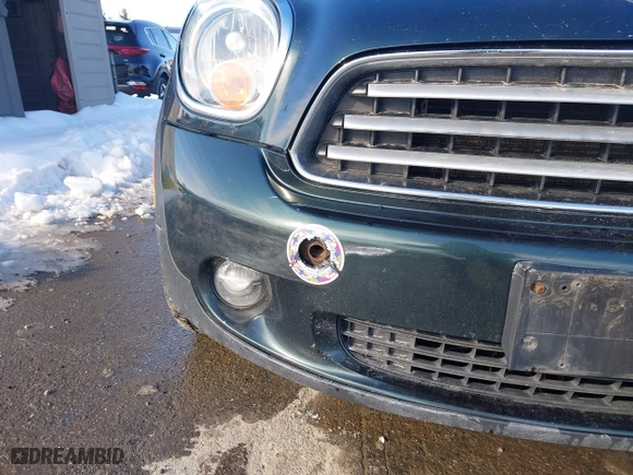 2013 MINI Cooper Countryman with VIN WMWZB3C57DWR35705, listed as a IAAI auction lot 41620080 with 197,884 mi miles. Bid and sale history available at carsss.com. Image 6.