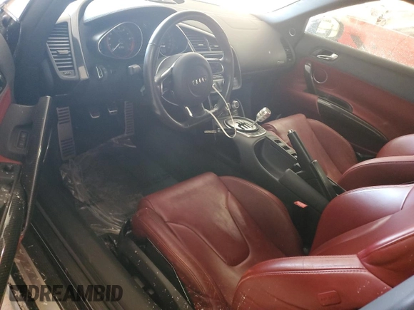 2011 Audi R8 z VIN WUATNAFG7BN002863, wystawiony jako Copart lot #87601245 z przebiegiem Nie podano mil oraz Tytuł czysty. Historia ofert i sprzedaży dostępna na DreamBid. Obrazek 8.