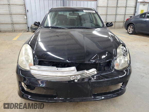 2003 Infiniti G35 w/Leather with VIN JNKCV51EX3M323960, listed as a Copart auction lot 74465534 with 208,433 mi miles and Salvage Title. Bid and sale history available at DreamBid. Image 5.