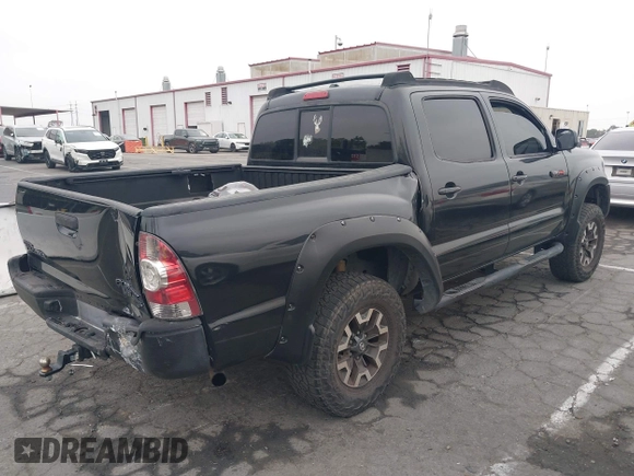 2009 Toyota Tacoma PreRunner with VIN 3TMJU62N99M076105, listed as a IAAI auction lot 42709523 with 206,948 mi miles and . Bid and sale history available at DreamBid. Image 4.