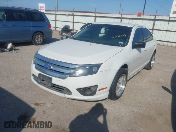 2011 Ford Fusion S with VIN 3FAHP0GA4BR268927, listed as a IAAI auction lot 41772569 with 305,339 mi miles. Bid and sale history available at carsss.com. Image 2.