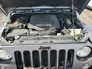 2014 Jeep Wrangler Sahara with VIN 1C4AJWBG0EL241643, listed as a Copart auction lot 56491155 with 113,596 mi miles and Salvage title. Bid and sale history available at DreamBid. Image 11.