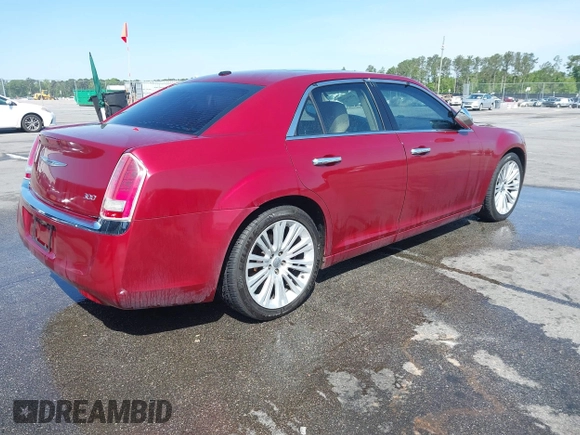 2012 Chrysler 300 Limited with VIN 2C3CCACG5CH165341, listed as a IAAI auction lot 42036190 with 184,536 mi miles. Bid and sale history available at carsss.com. Image 4.