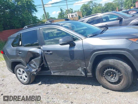 2019 Toyota RAV4 LE with VIN JTMG1RFV9KD014526, listed as a IAAI auction lot 42638858 with 90,995 mi miles and . Bid and sale history available at DreamBid. Image 14.