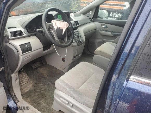 2014 Honda Odyssey LX with VIN 5FNRL5H24EB090456, listed as a Copart auction lot 48709045 with 145,263 mi miles and Clean Title. Bid and sale history available at carsss.com. Image 7.