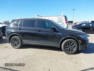 2023 Volkswagen Tiguan SE with VIN 3VV3B7AX3PM085470, listed as a IAAI auction lot 41731153 with 14,911 mi miles and . Bid and sale history available at DreamBid. Image 14.