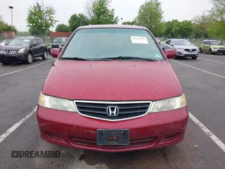 2003 Honda Odyssey EX-L with VIN 5FNRL18993B009180, listed as a IAAI auction lot 42224572 with 187,781 mi miles and . Bid and sale history available at DreamBid. Image 6.
