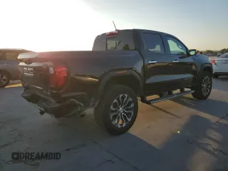 2023 GMC Canyon 4WD Denali with VIN 1GTP6FEK8P1164692, listed as a Copart auction lot 77033234 with 5,644 mi miles and Salvage Title. Bid and sale history available at carsss.com. Image 3.