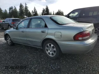 1999 Mazda 626 ES with VIN 1YVGF22C1X5835600, listed as a Copart auction lot 84965004 with 217,352 mi miles and Salvage Title. Bid and sale history available at carsss.com. Image 2.