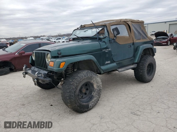 2000 Jeep Wrangler Sahara z VIN 1J4FA59S5YP803327, wystawiony jako Copart lot #44382505 z przebiegiem Nie podano mil oraz Szkoda całkowita • Salvage title. Historia ofert i sprzedaży dostępna na DreamBid. Obrazek 1.