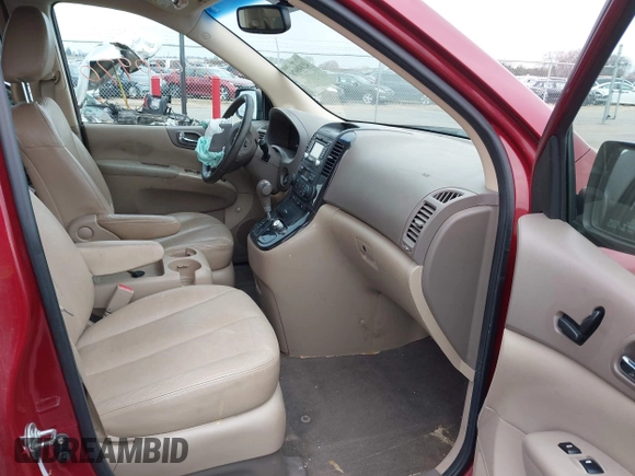 2012 Kia Sedona EX with VIN KNDMH4C76C6463143, listed as a IAAI auction lot 41990970 with 214,045 mi miles. Bid and sale history available at carsss.com. Image 5.